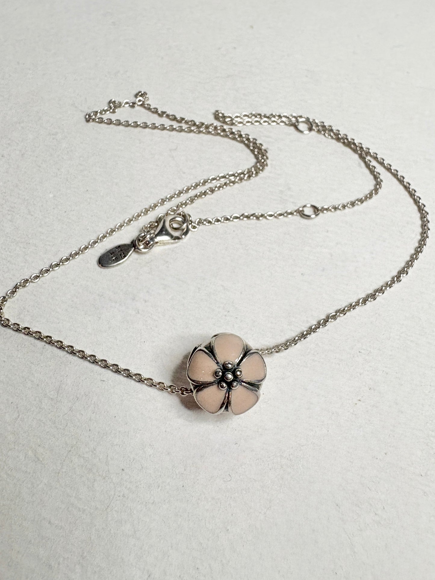 Pandora sterling silver adjustable chain with a cherry blossom stopper bead.