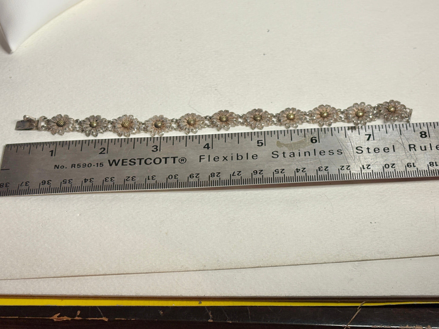 Vintage two-toned 800 silver floral daisy bracelet with gold-plated centers.