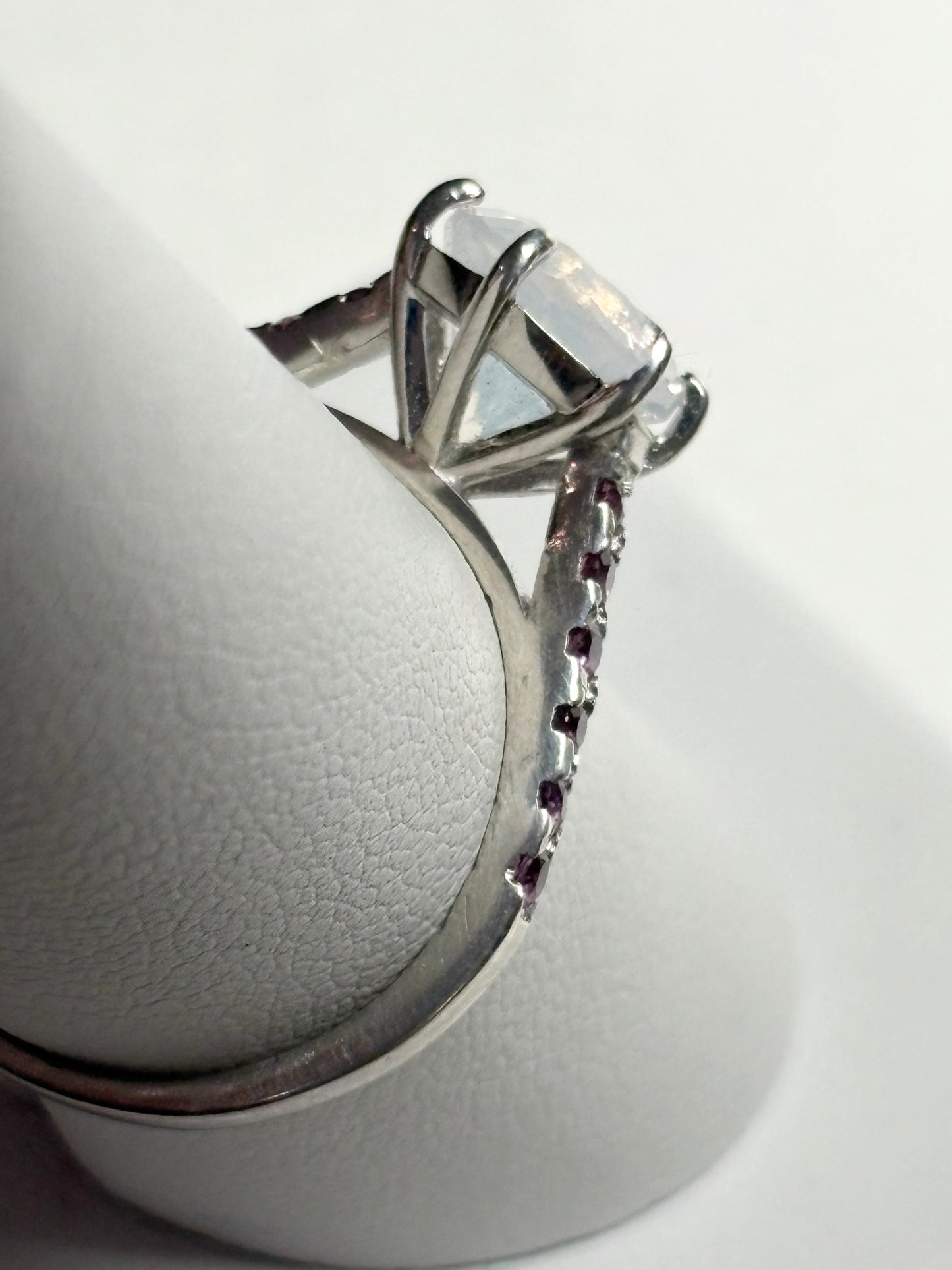 Sterling silver ring with milky white quartz and rhodolite garnets.