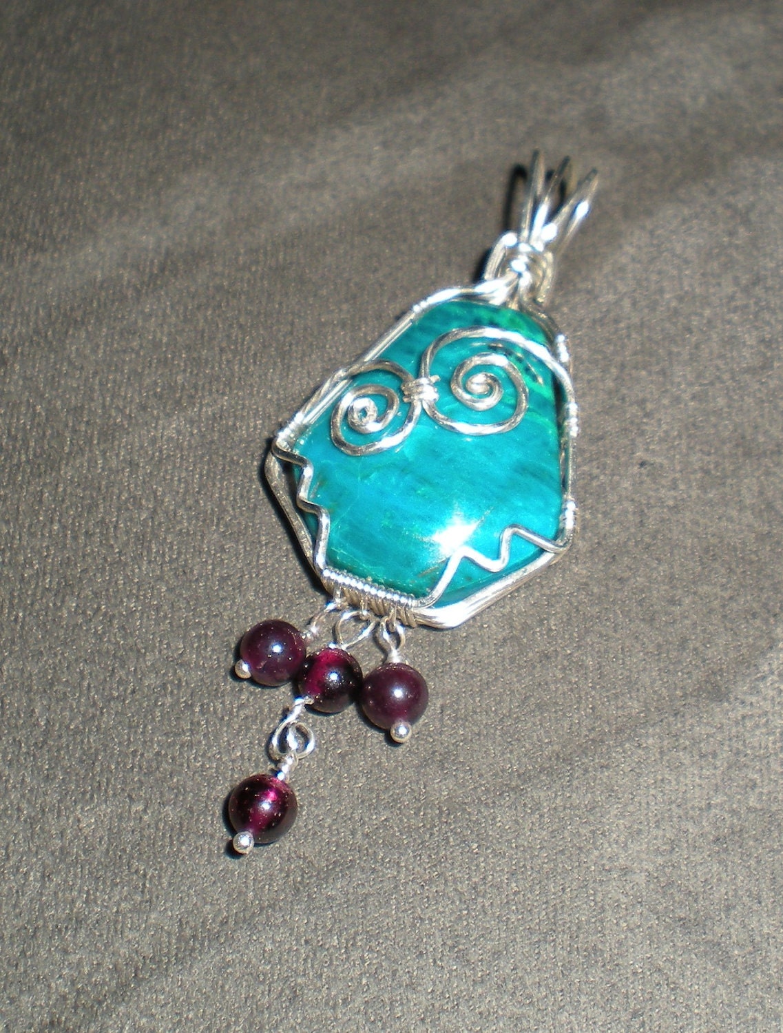 Chrysocolla and garnet sterling silver wire wrapped pendant