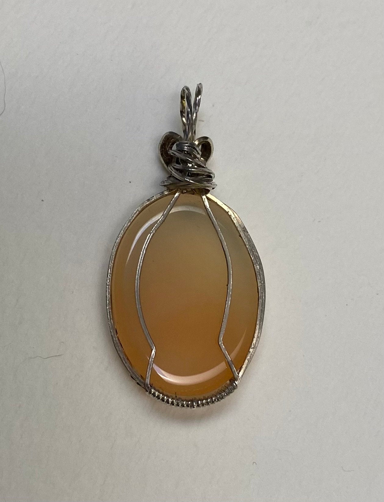 Peach Chalcedony sterling silver wire wrapped pendant