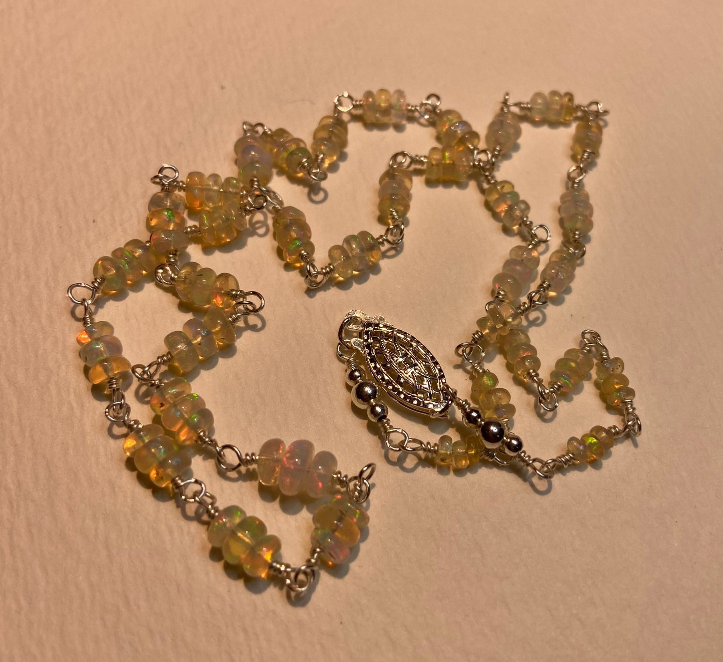 Ethiopian Wello Opal beaded necklace in solid sterling silver with filigree clasp.