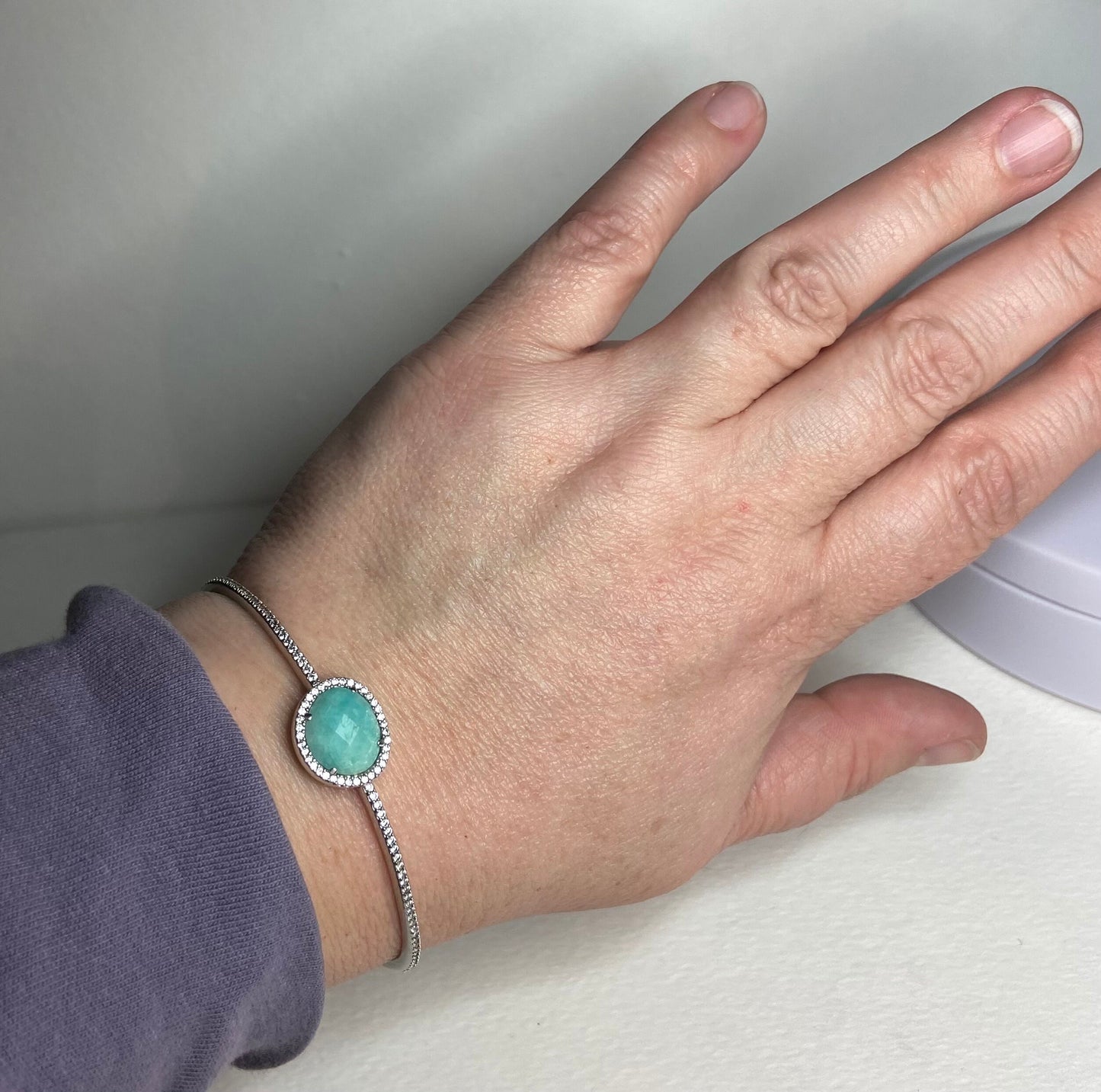 Nadri sterling silver hinged bangle bracelet with amazonite and simulated diamonds.