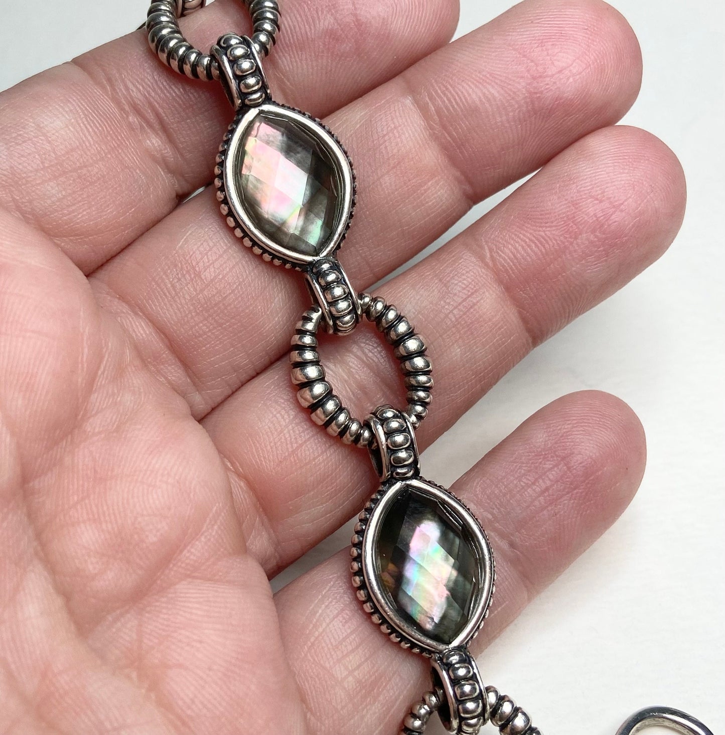 Sterling silver Lagos bracelet with Tahitian black-lipped oyster mother of pearl and quartz doublet.