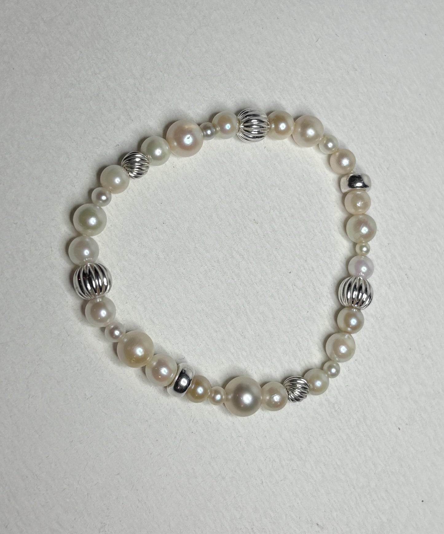 Vintage Akoya cultured pearl stretch bracelet with sterling silver beads.