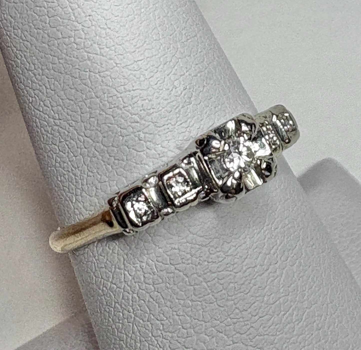 Vintage 14k two-tone gold engagement ring with diamonds.