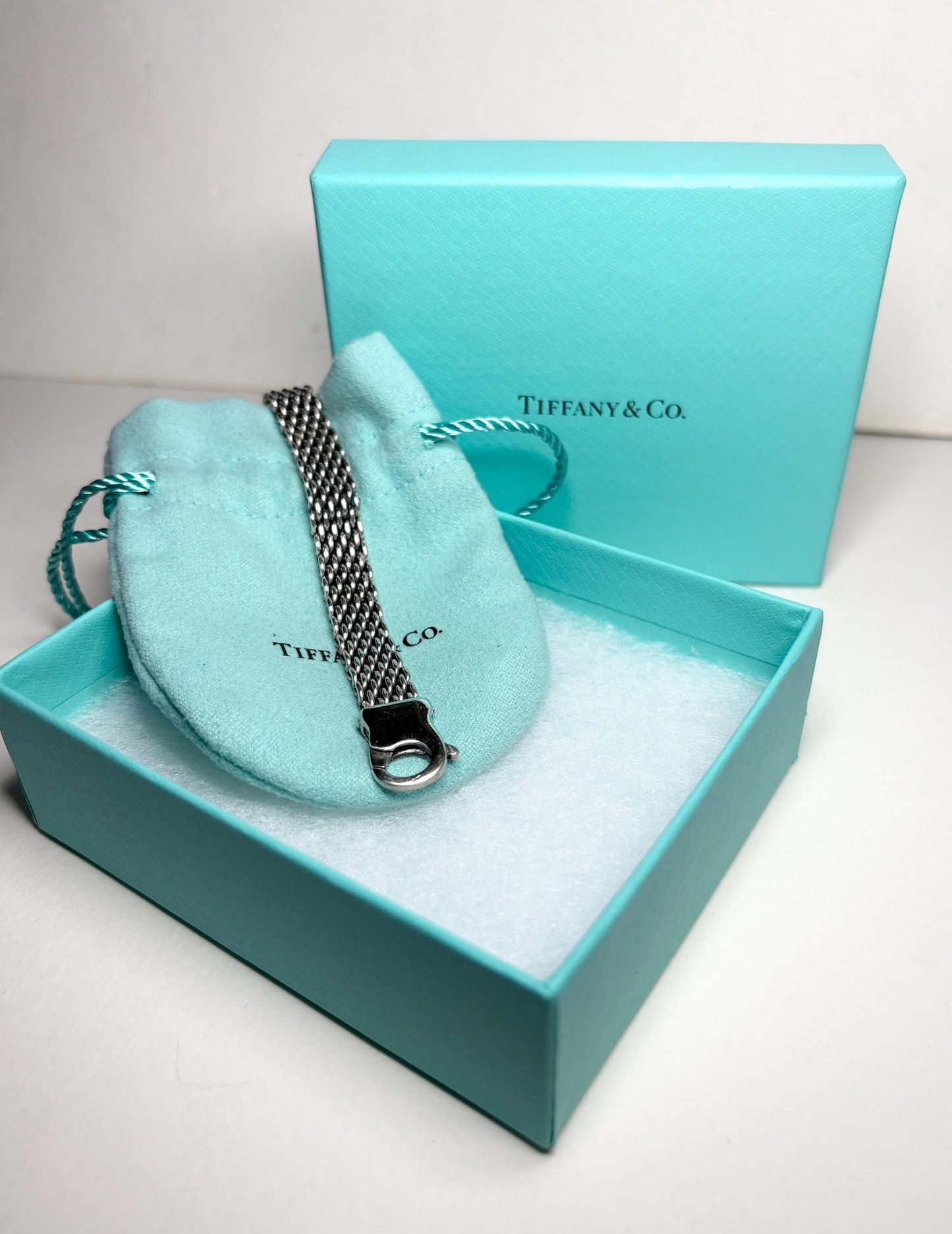 Vintage Tiffany & Co. sterling silver mesh bracelet with lobster claw clasp in a Tiffany box.