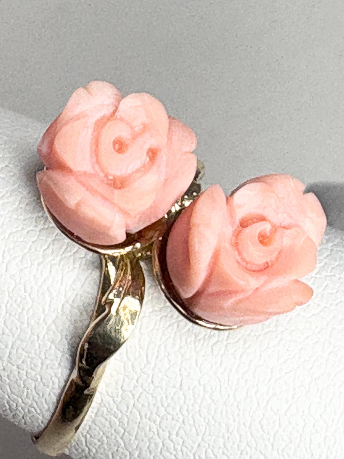A 10k gold ring with two angel skin coral rose buds.