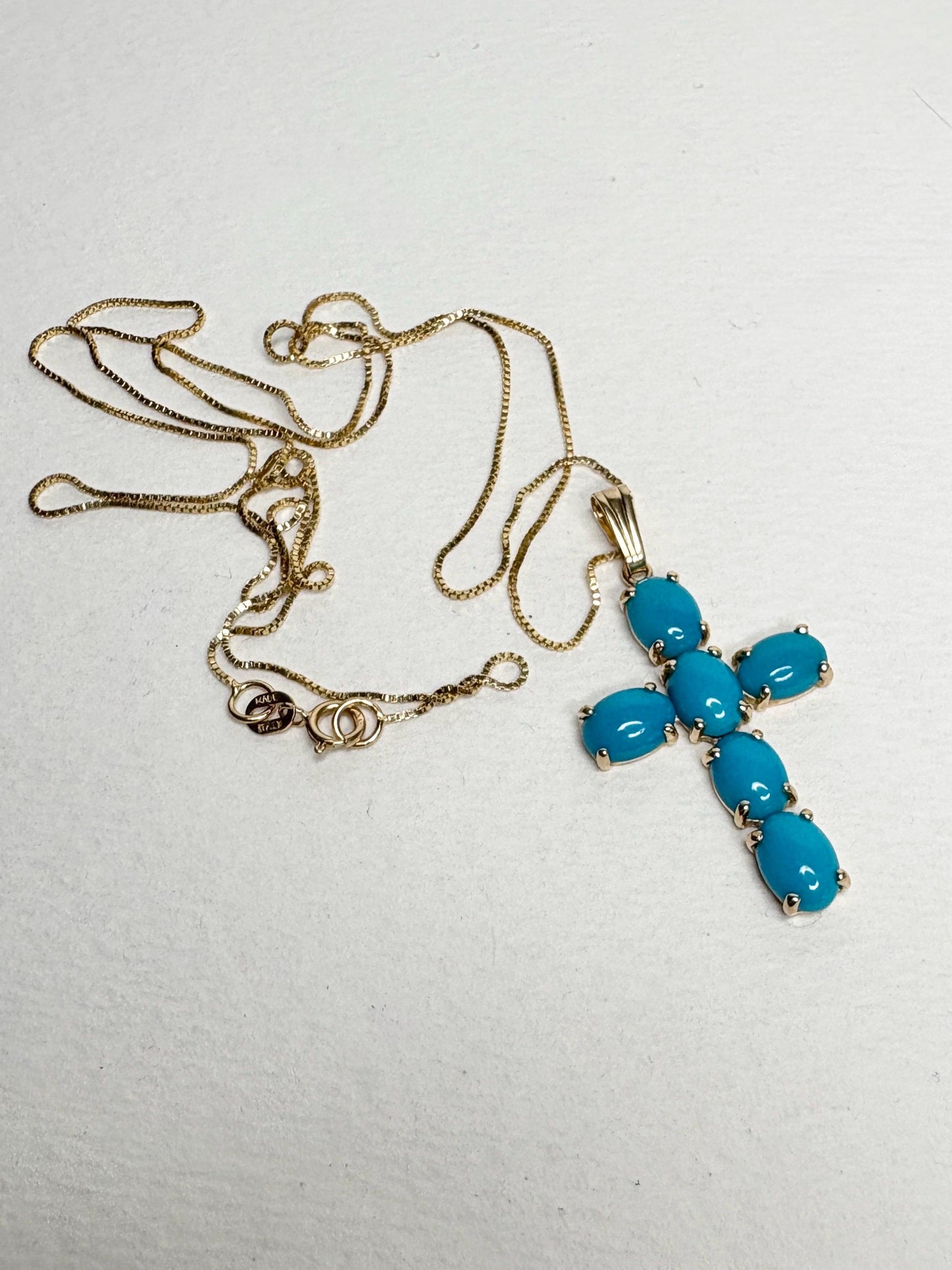 14k gold cross pendant necklace with six Sleeping Beauty turquoise stones on a 22" box chain.