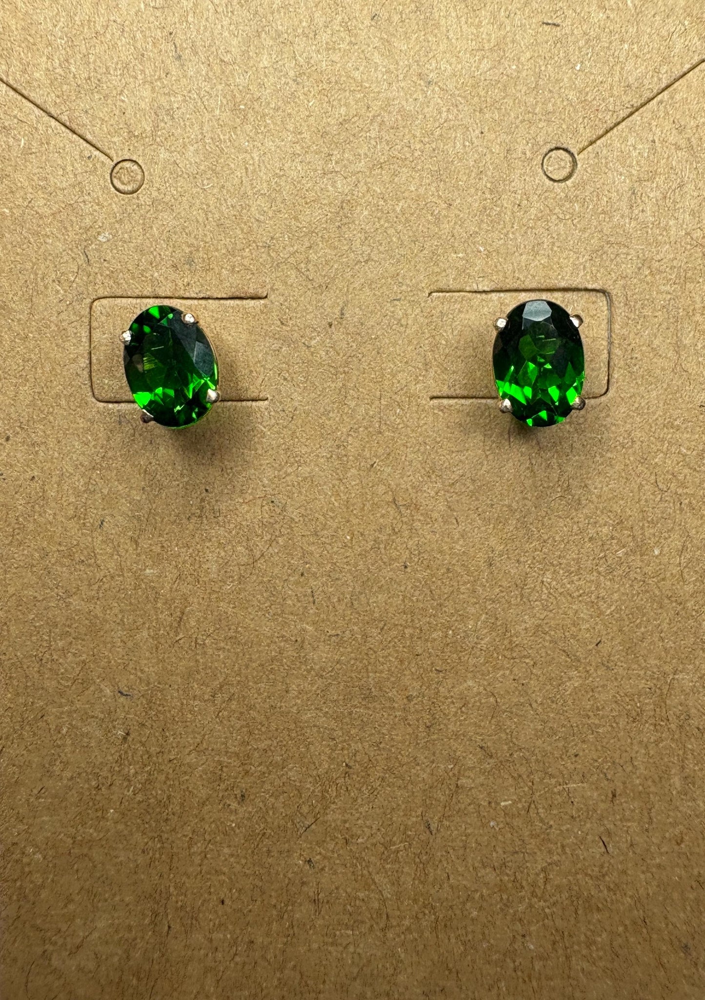 14k gold stud earrings with oval chrome diopside stones.
