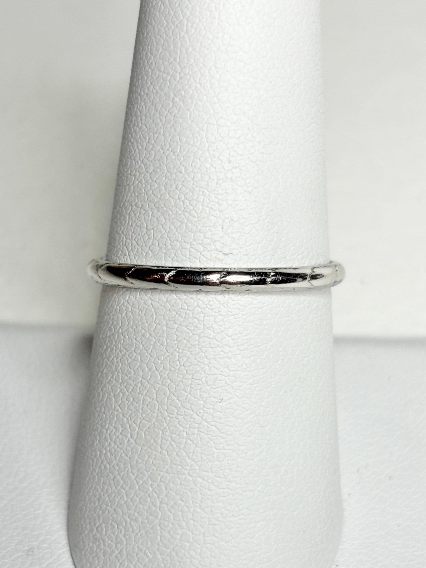 Art Deco platinum iridium stackable chevron thin band ring.