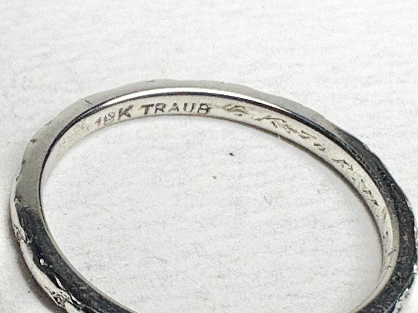 Retro 18k white gold chevron band ring with "18K TRAUB" inscription.