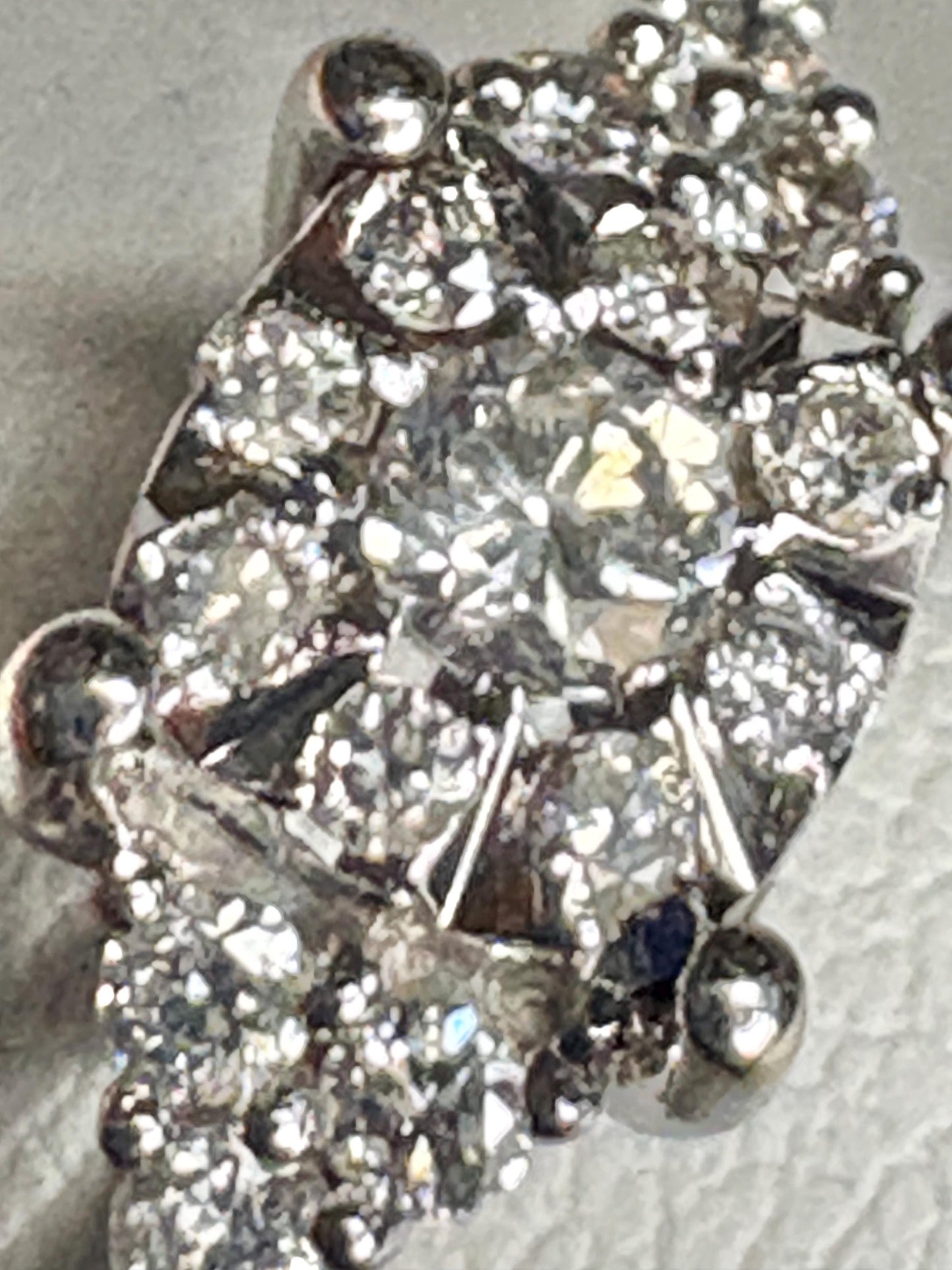 Squared diamond halo cluster ring in solid 14k white gold.