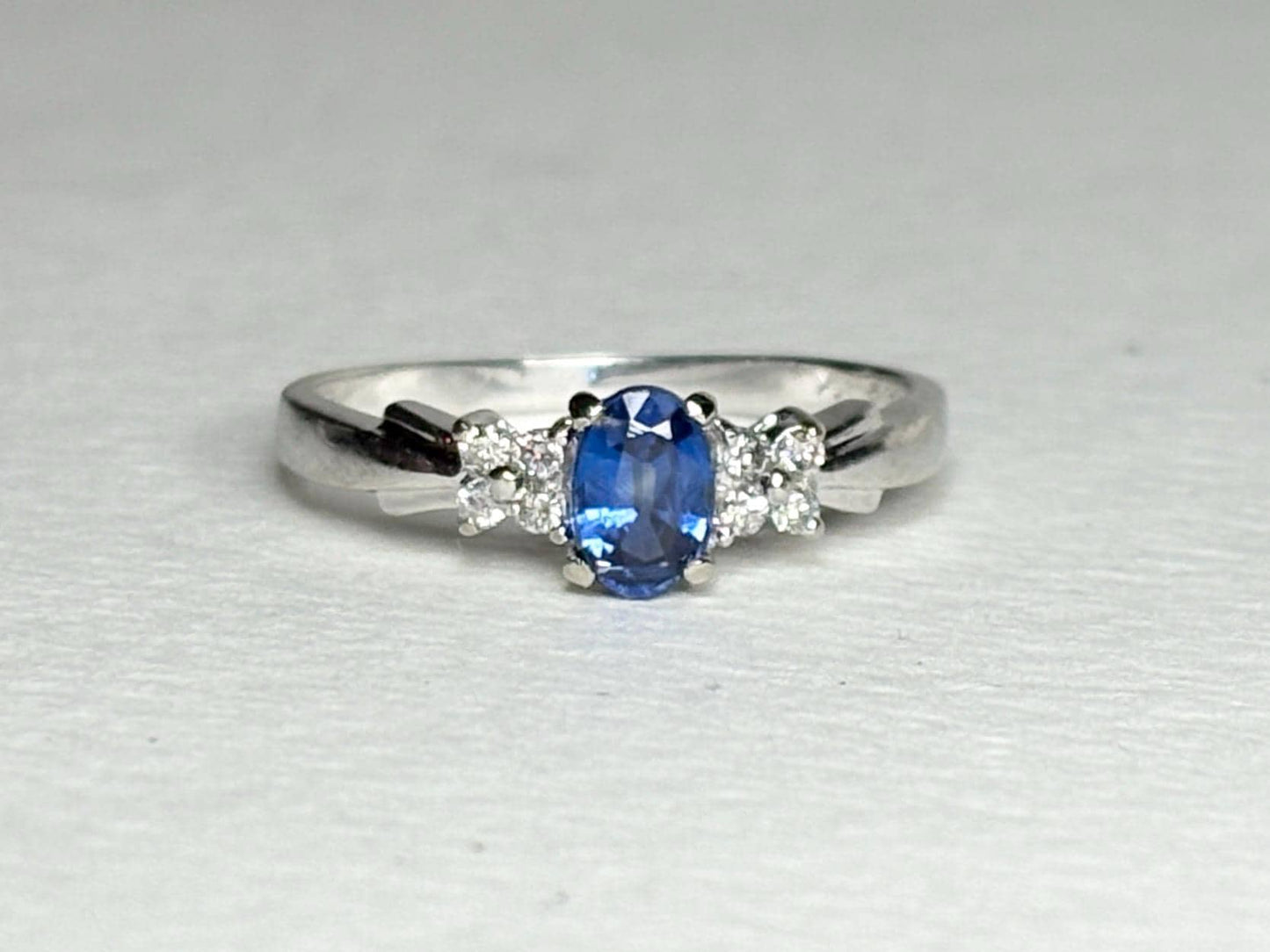 Oval kyanite and diamond ring in 10k white gold.