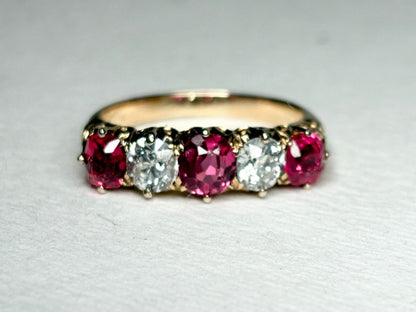 Antique 14k gold band ring with red spinel and old mine cut diamonds.