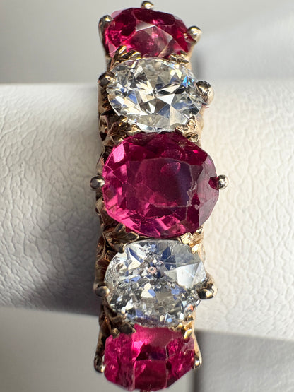 Antique 14k gold band ring with red spinel and old mine cut diamonds.