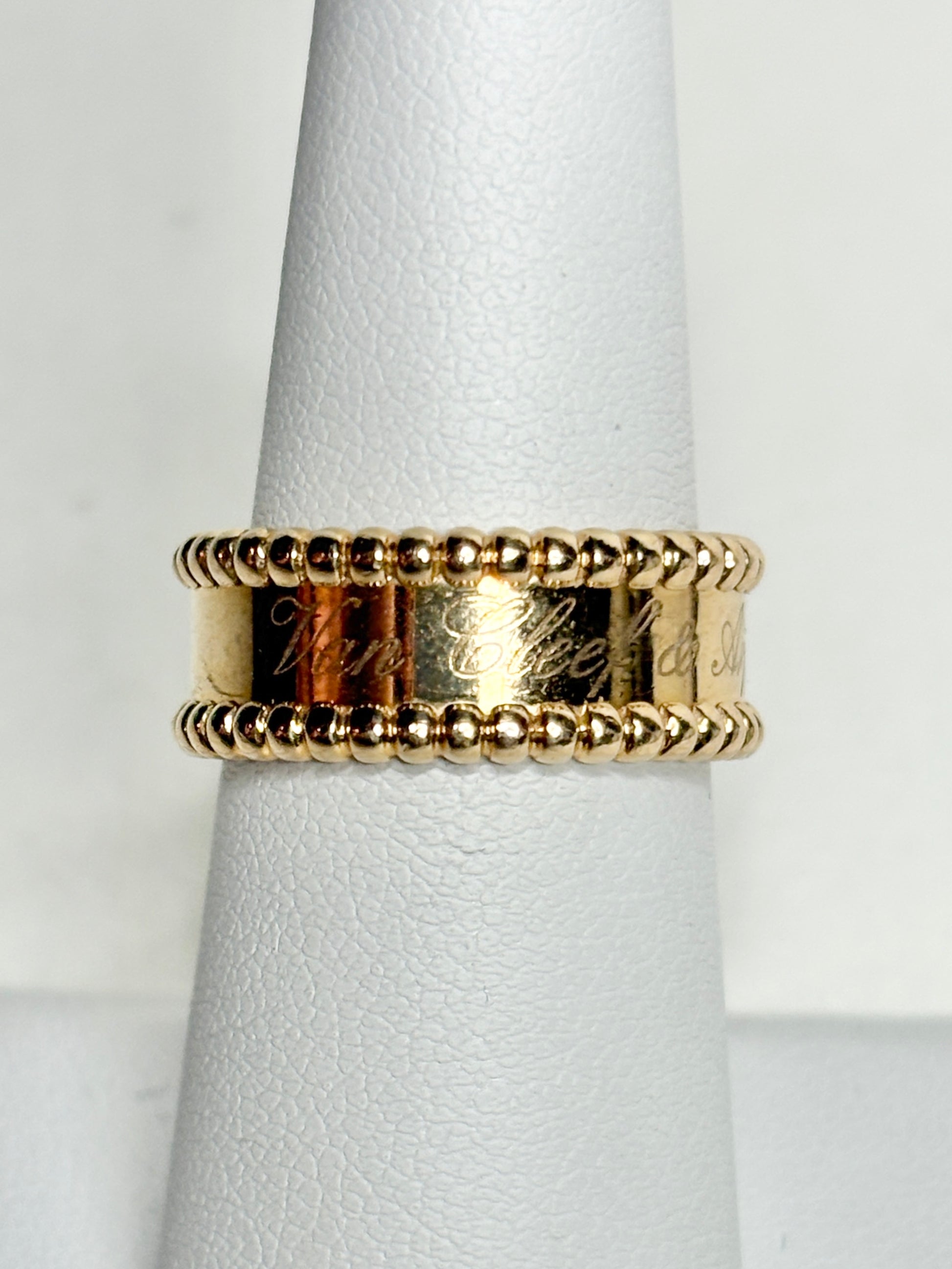 Van Cleef & Arpels Perlee Signature band ring in 18k gold.