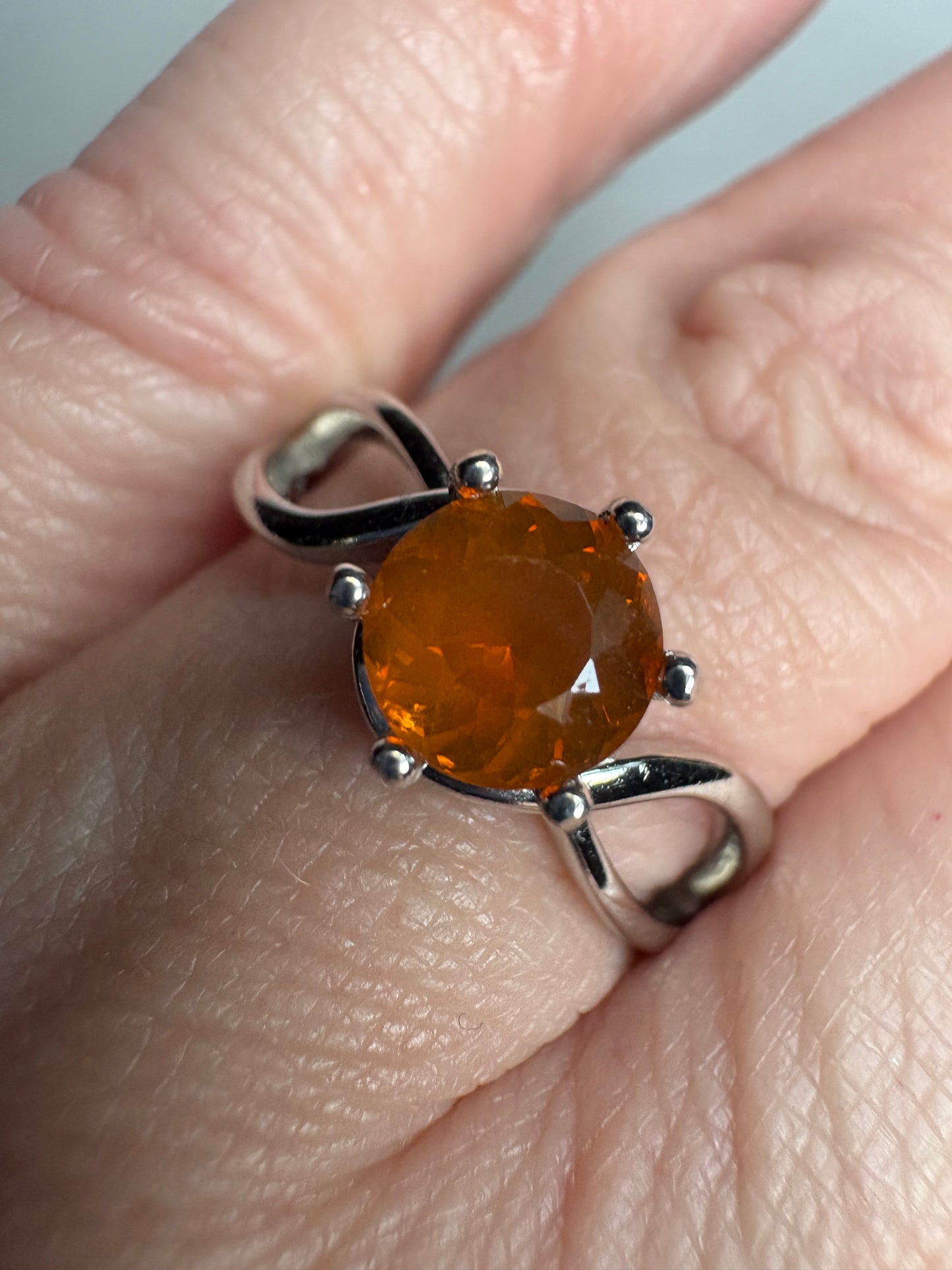 Sterling silver ring with a round Oregon fire opal.