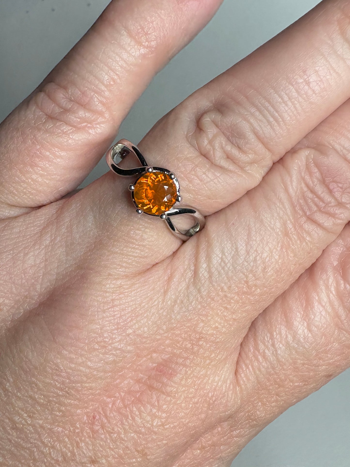 Sterling silver ring with a round Oregon fire opal.