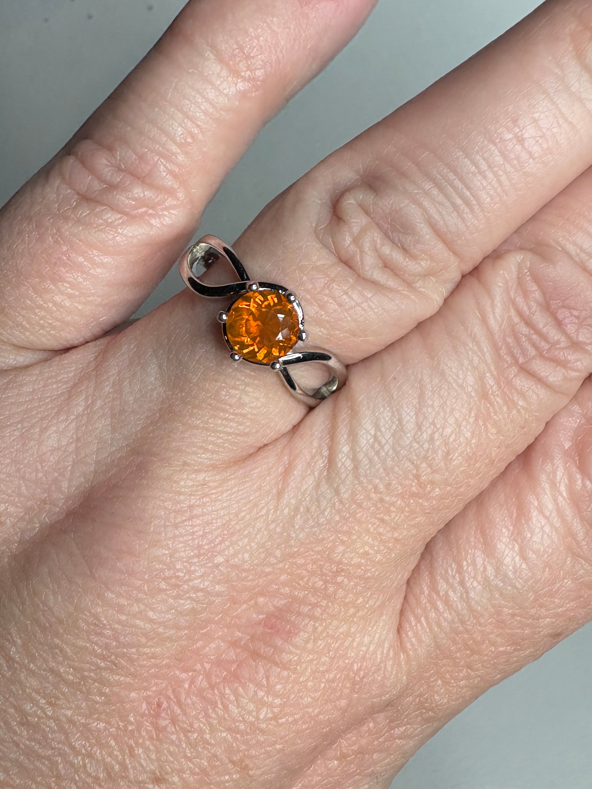 Sterling silver ring with a round Oregon fire opal.