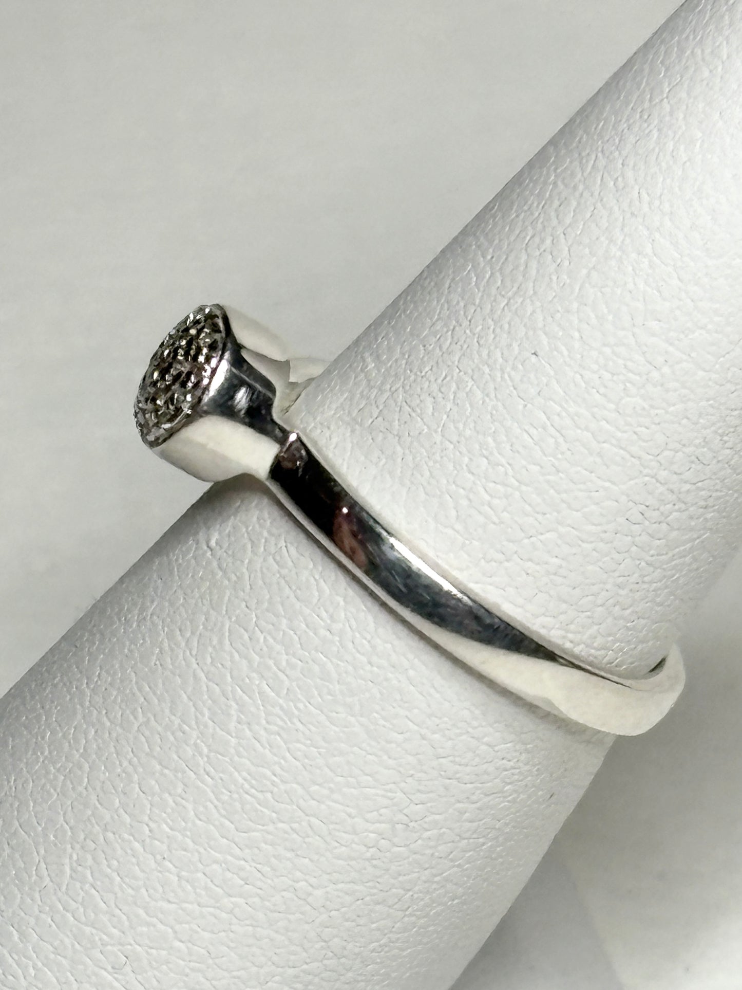 Monica Vinader sterling silver ring with pave diamonds.