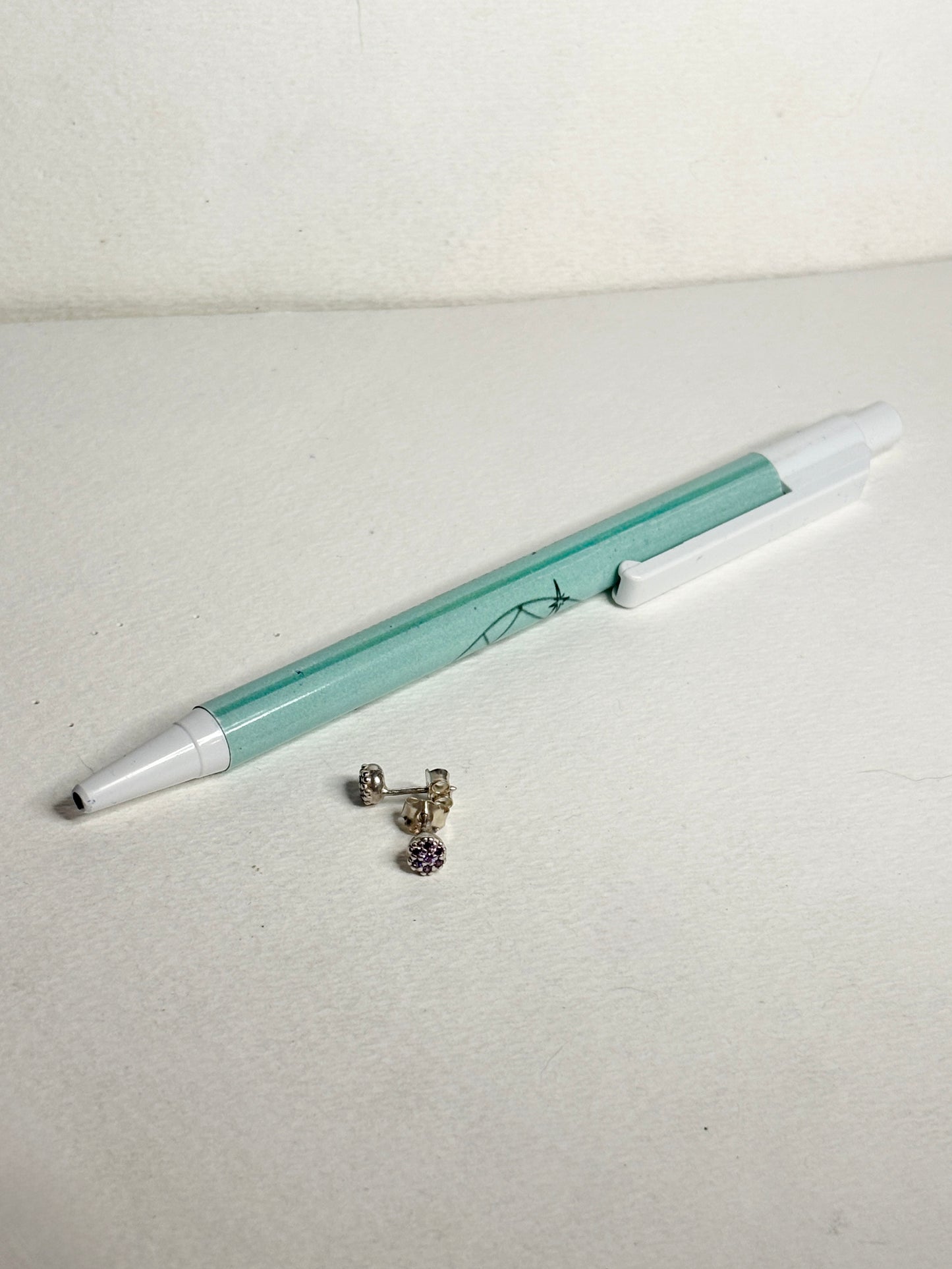 Violet purple pave Pandora stud earrings in sterling silver.