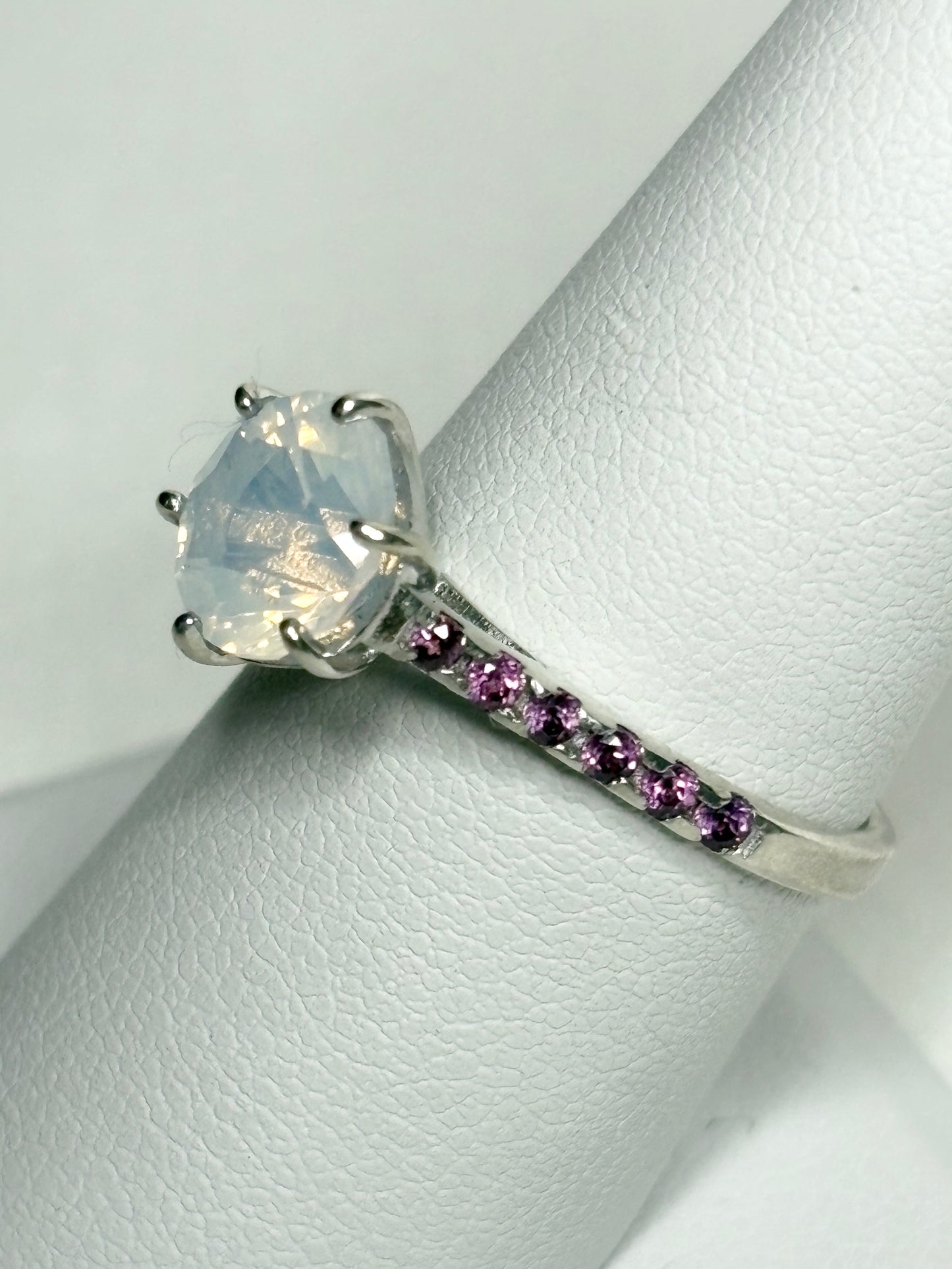 Sterling silver ring with milky white quartz and rhodolite garnets.