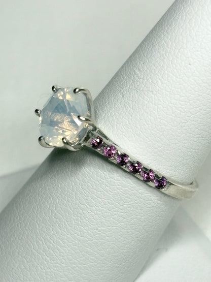 Sterling silver ring with milky white quartz and rhodolite garnets.