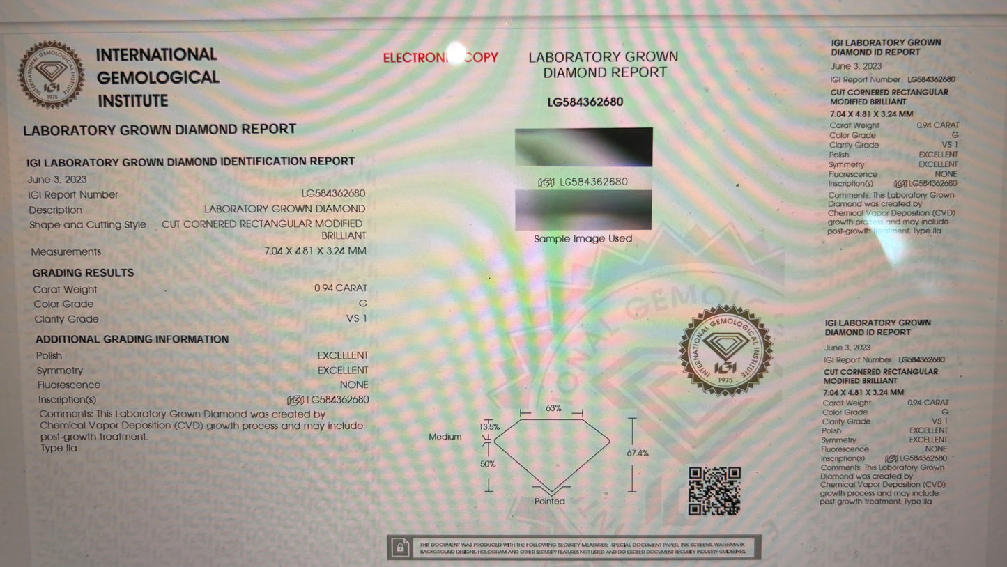 IGI report for a 0.94 carat modified rectangular brilliant cut lab-grown diamond.