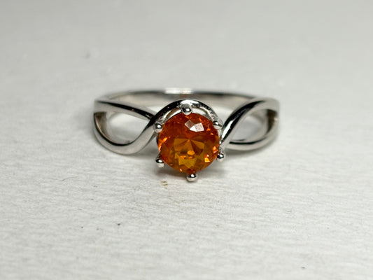 Sterling silver ring with a round Oregon fire opal gemstone.