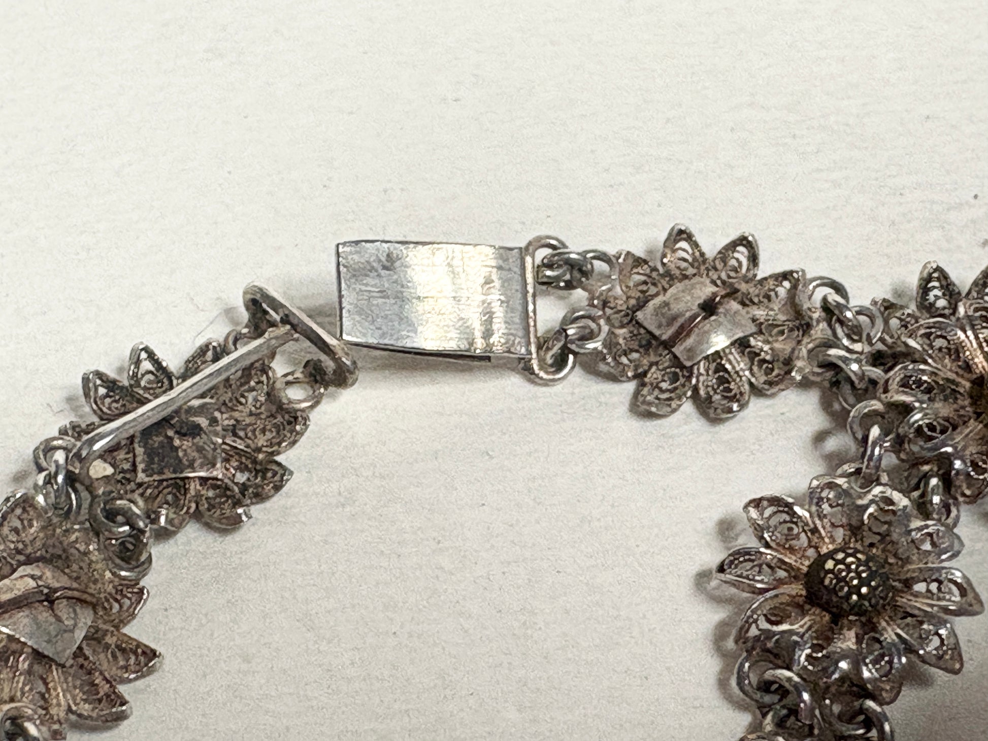 Vintage two-toned 800 silver floral daisy bracelet with gold-plated centers.