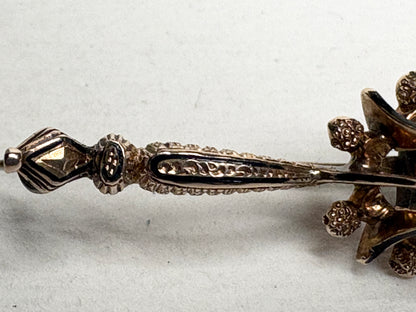 Antique 14k gold brooch with enamel inlay and paste gem.