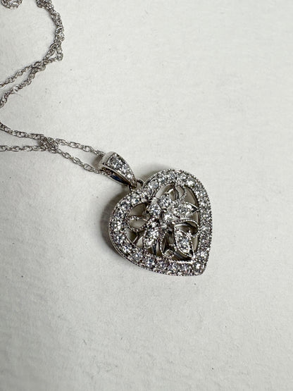 14k white gold heart pendant necklace with natural diamonds.