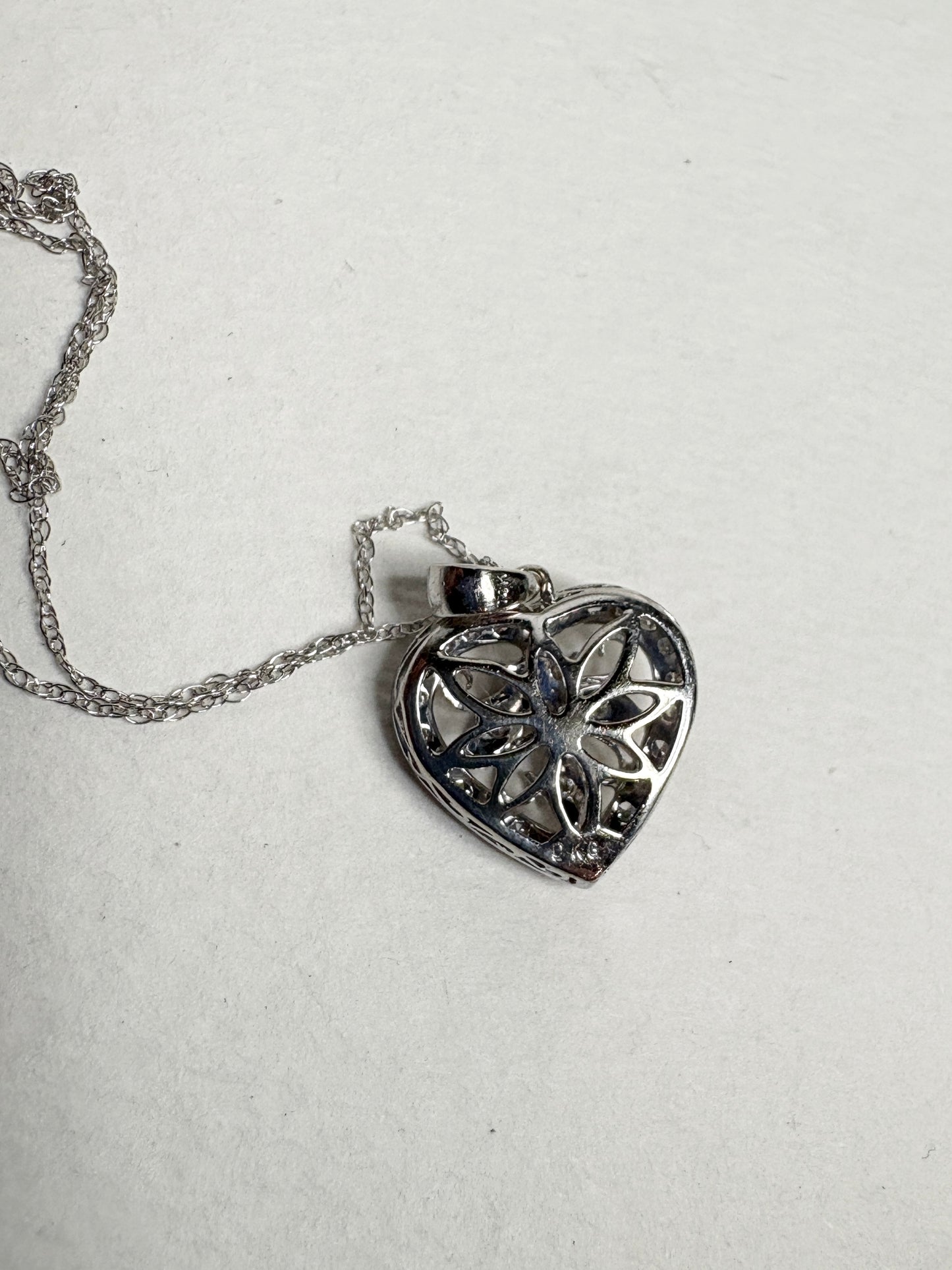 14k white gold heart pendant necklace with diamonds.