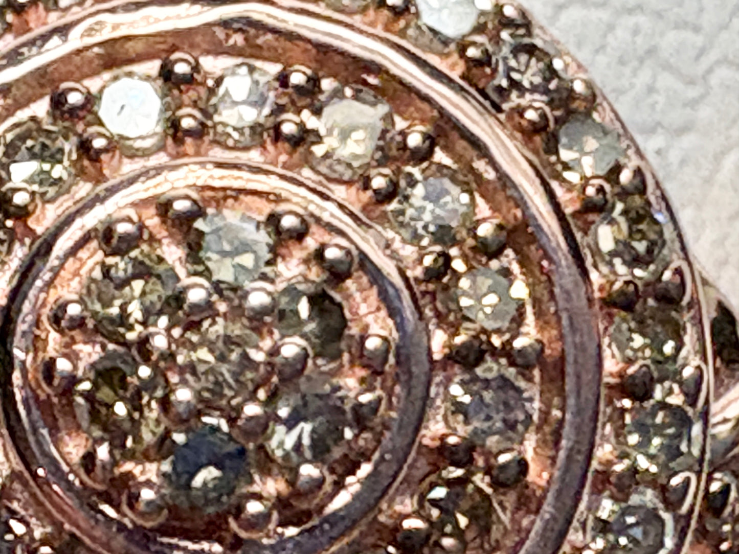 Rose gold over sterling silver ring with pave set champagne and brown diamonds.