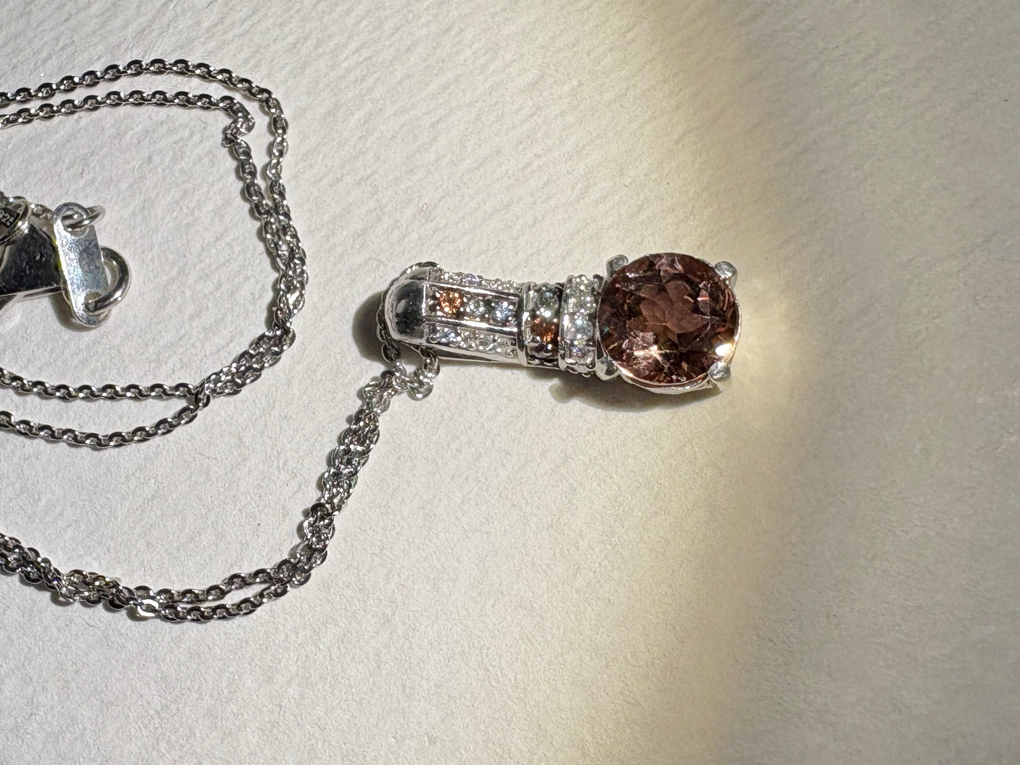 Sterling silver pendant necklace with color-change glass, moissanite, and multi-color sapphires.