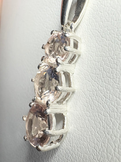 Sterling silver pendant necklace with three natural morganite stones.