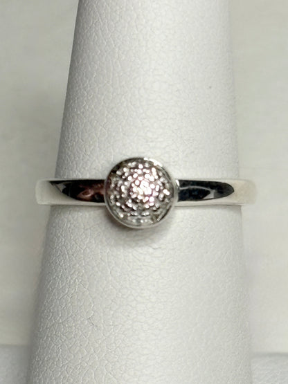 Monica Vinader sterling silver ring with pave diamonds on a button design.