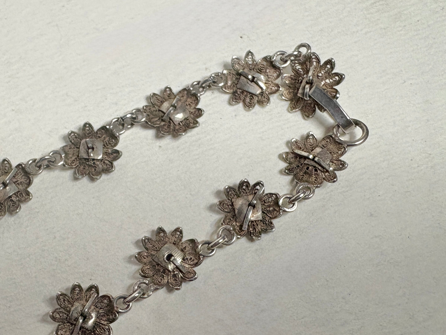 Vintage 800 silver filigree daisy necklace, 18.5 inches long.