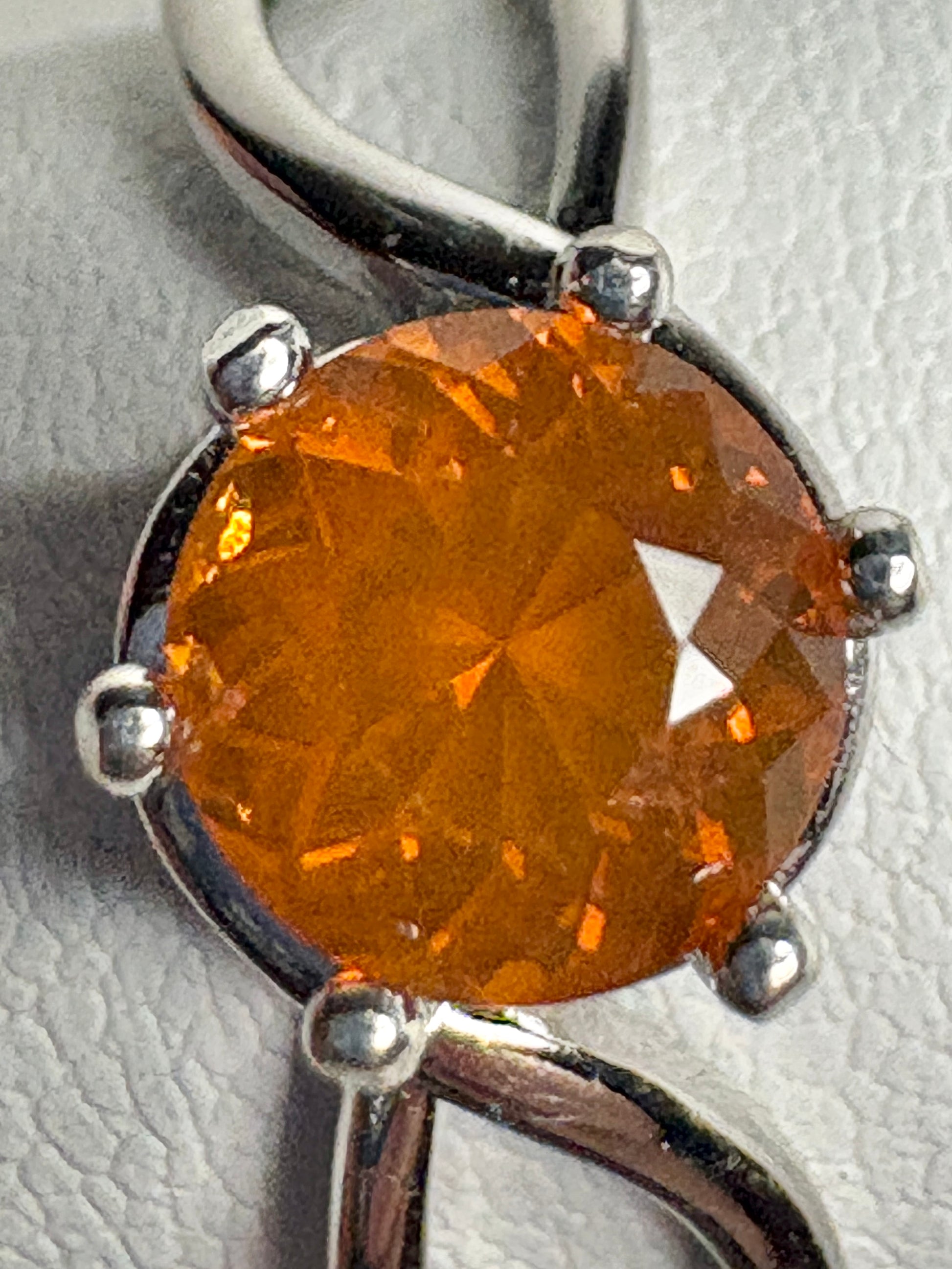 Sterling silver ring with a round Oregon fire opal.