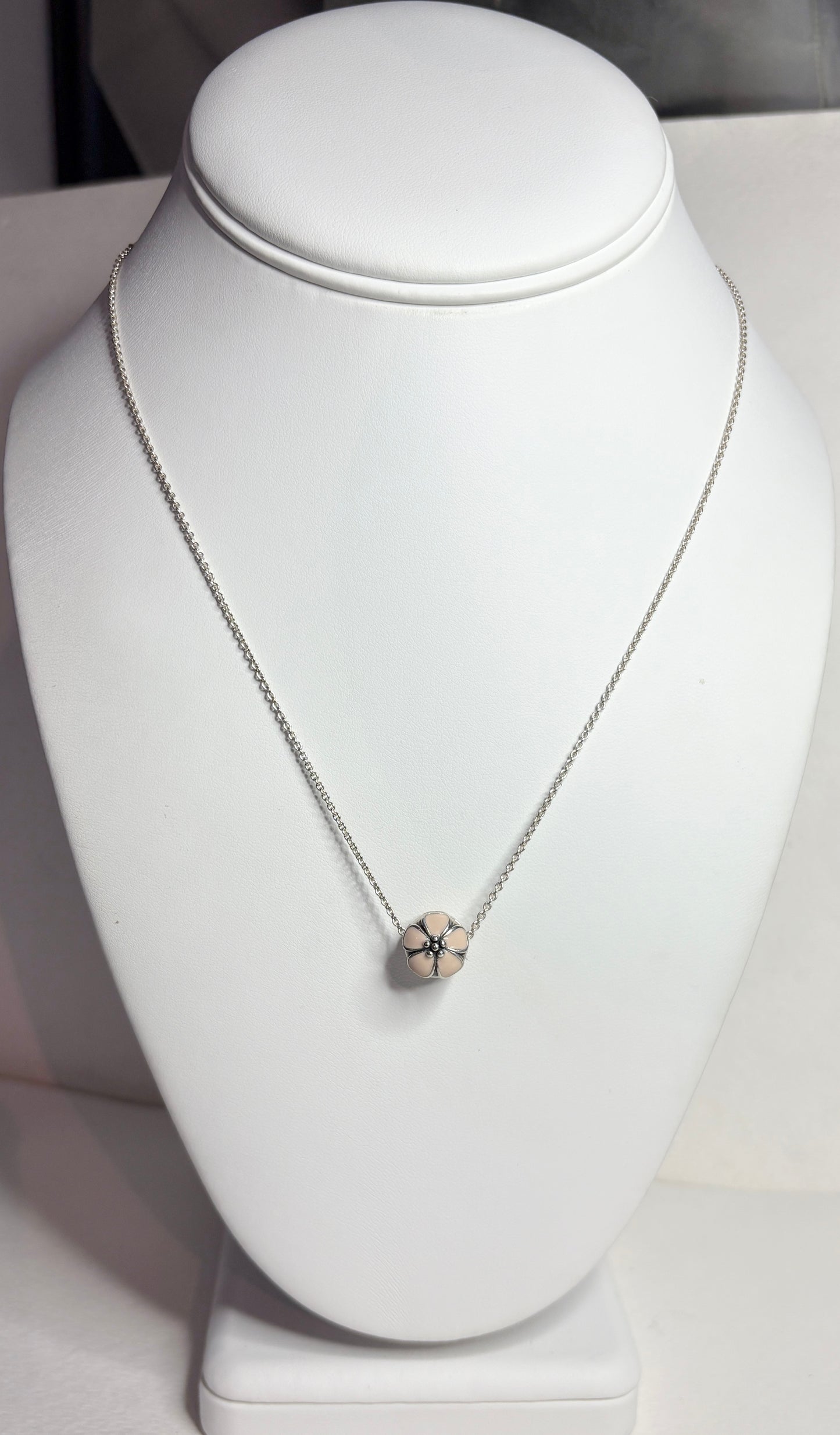 Pandora sterling silver cherry blossom stopper bead on an adjustable chain.