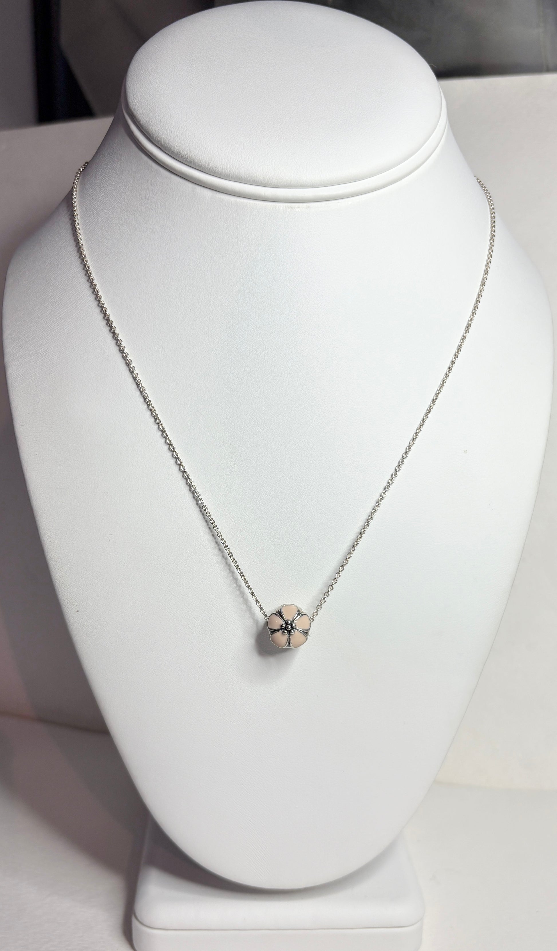 Pandora sterling silver cherry blossom stopper bead on an adjustable chain.