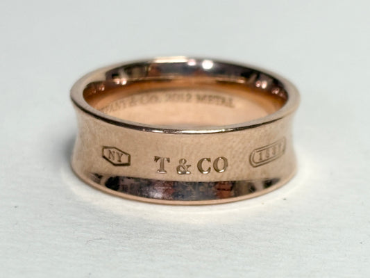 Tiffany & Co. rose gold colored Rubedo 1837 ring with "NY" and "T & CO" markings.
