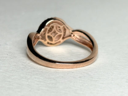 Rose gold over sterling silver ring with champagne brown diamonds.
