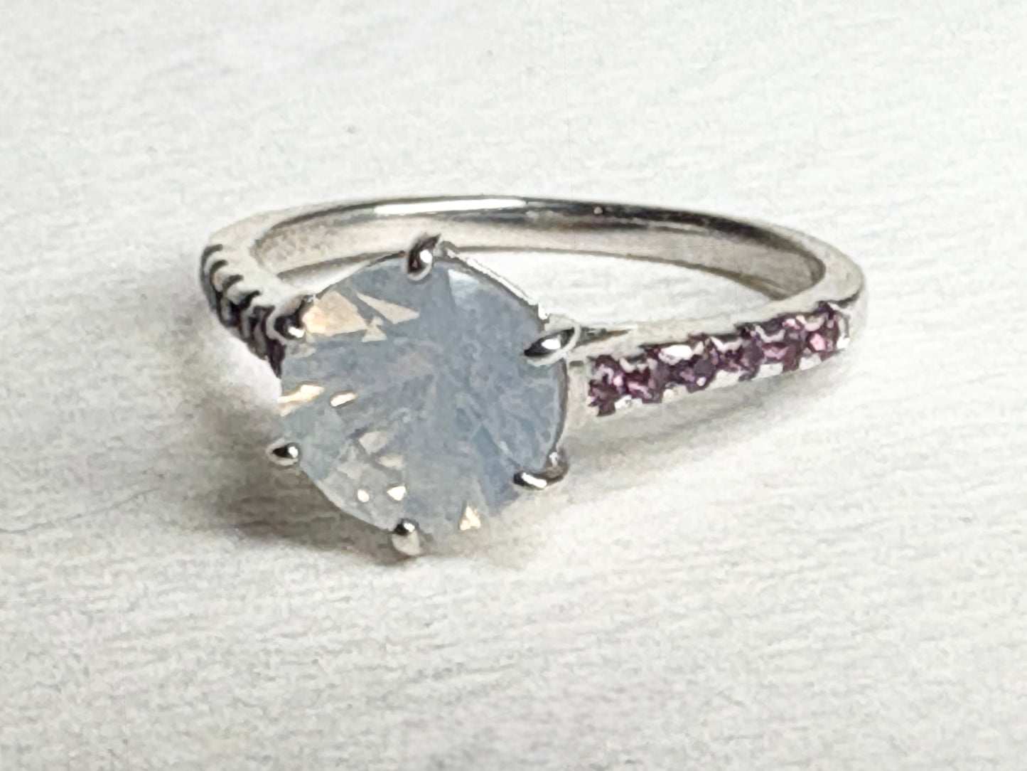 Sterling silver ring with milky white quartz and rhodolite garnets.