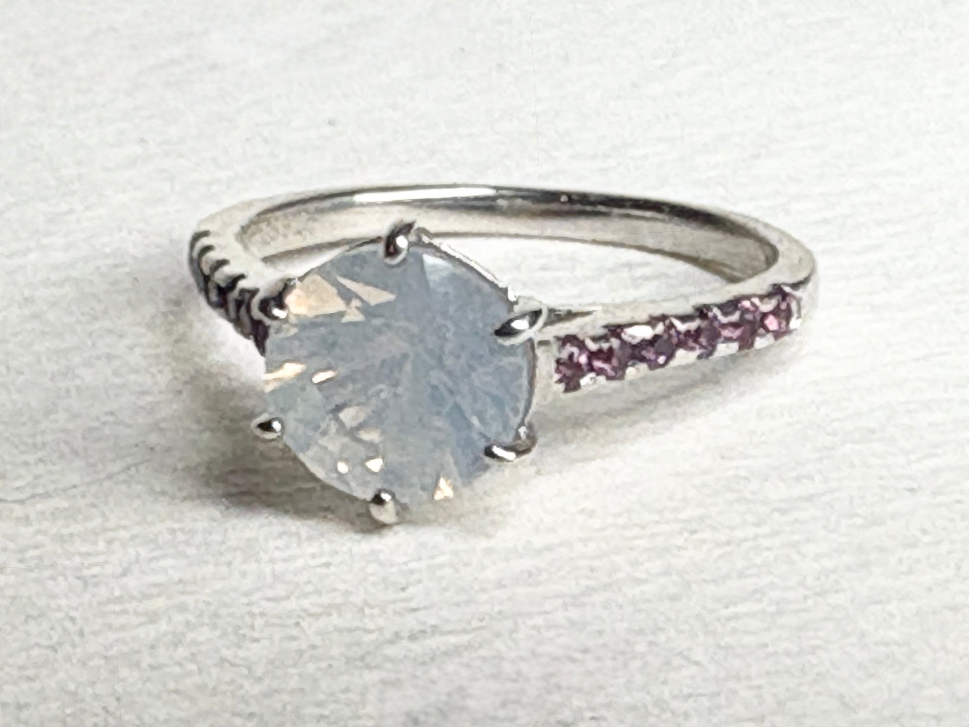 Sterling silver ring with milky white quartz and rhodolite garnets.