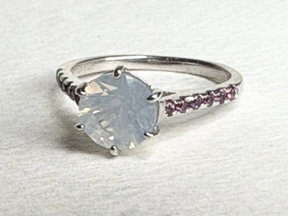 Sterling silver ring with milky white quartz and rhodolite garnets.