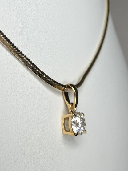 Gold over sterling silver necklace with a moissanite solitaire pendant.