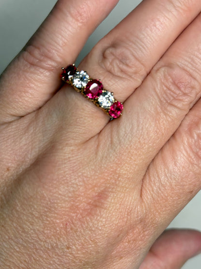 Antique 14k gold band ring with red spinel and old mine cut diamonds.