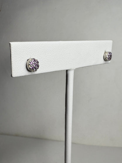Sterling silver stud earrings with pave-set violet purple cubic zirconia stones.